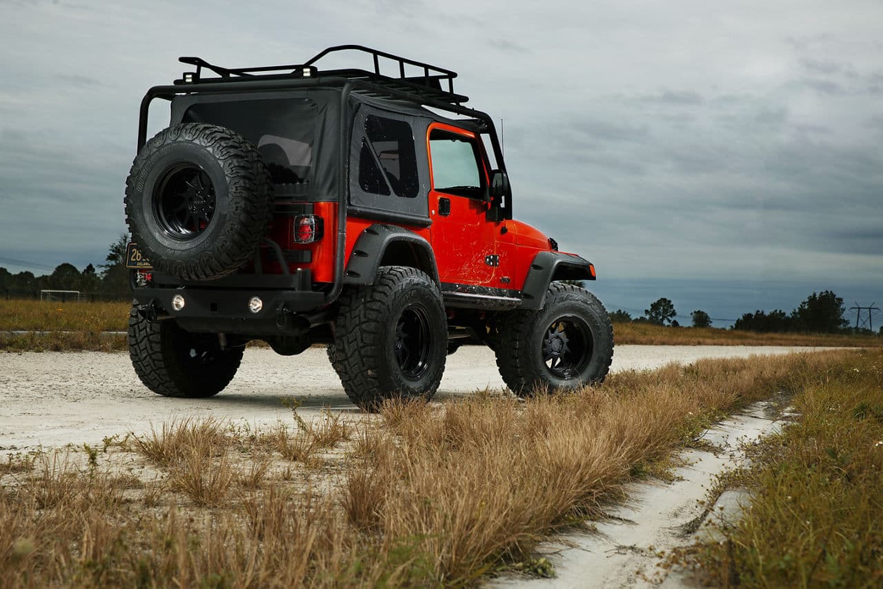 Rear view of 2013 Jeep Wrangler with wheels