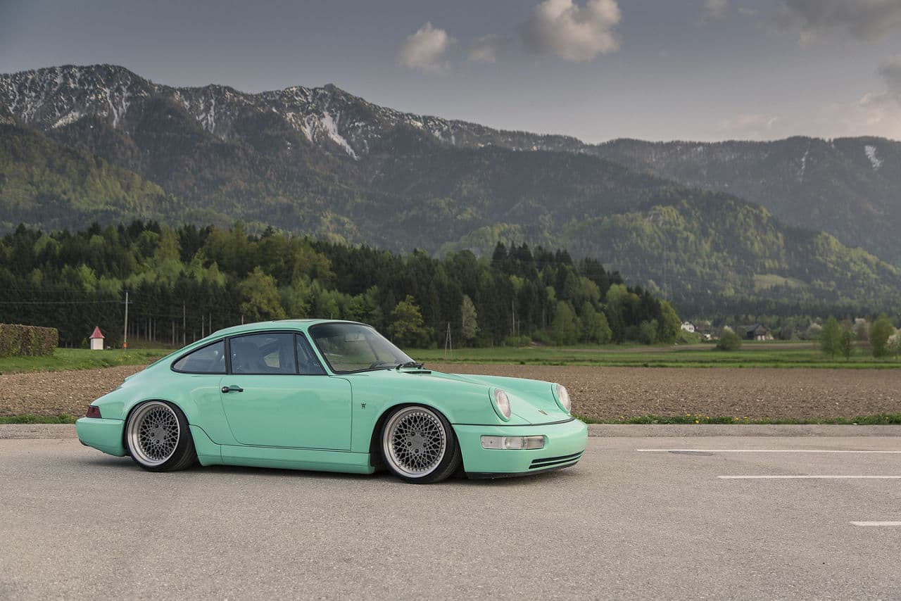 Rear view of 2013 Porsche 911 with wheels