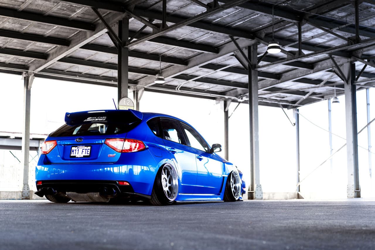 Rear view of 2013 Subaru WRX STI with wheels