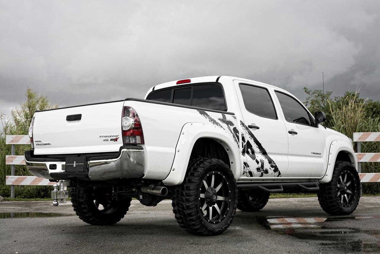 Side profile of 2013 Toyota Tacoma with truck suv wheels