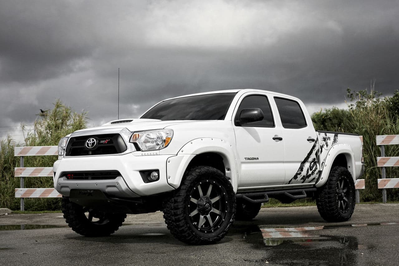 Detail view of 2013 Toyota Tacoma with truck suv wheels