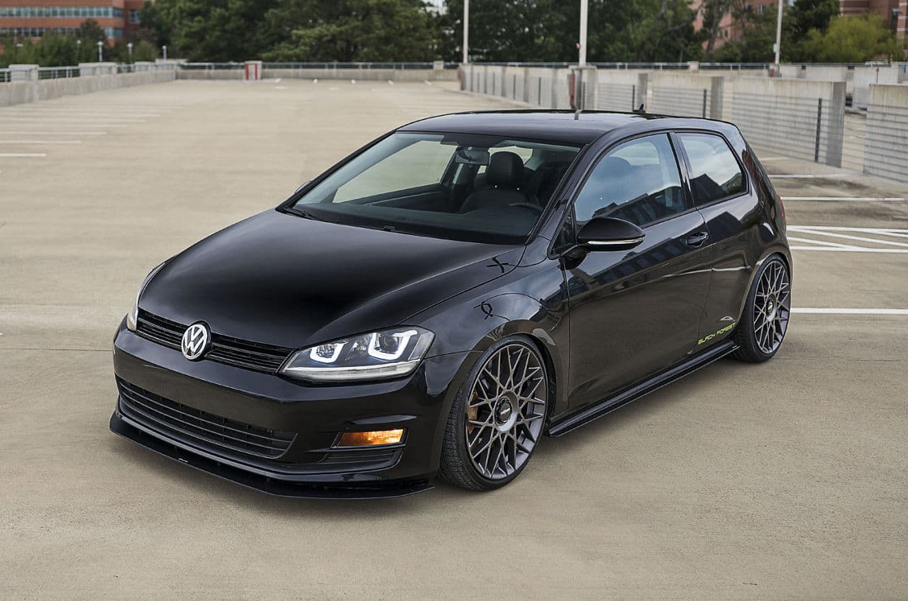 Side profile of 2013 Volkswagen Golf GTI with wheels