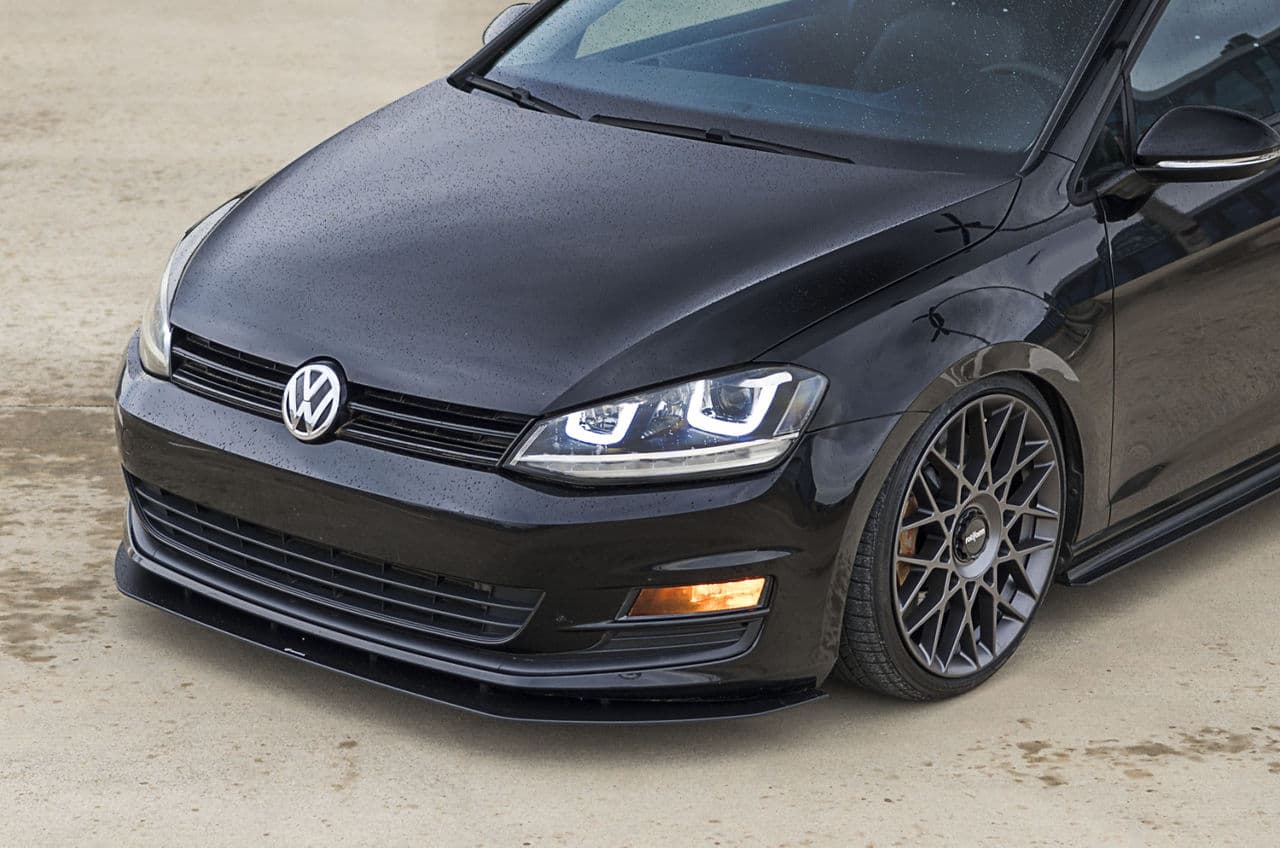 Rear view of 2013 Volkswagen Golf GTI with wheels