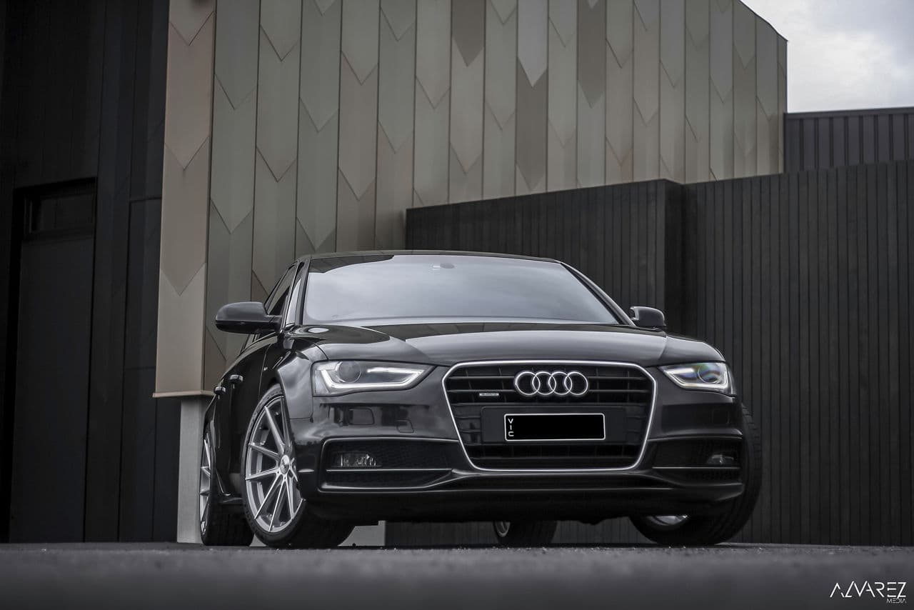 Side profile of 2014 Audi A4 with wheels