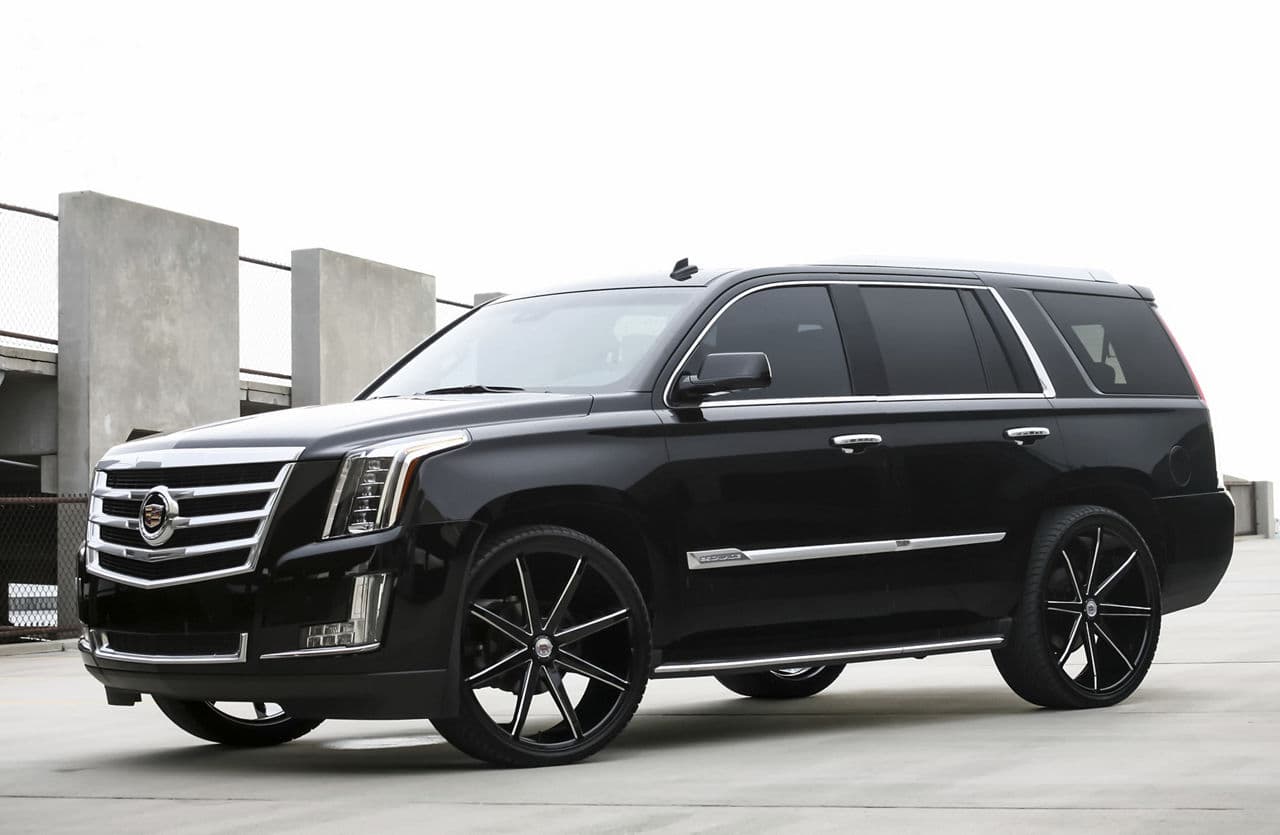 Front view of 2014 Cadillac Escalade with vehicle wraps
