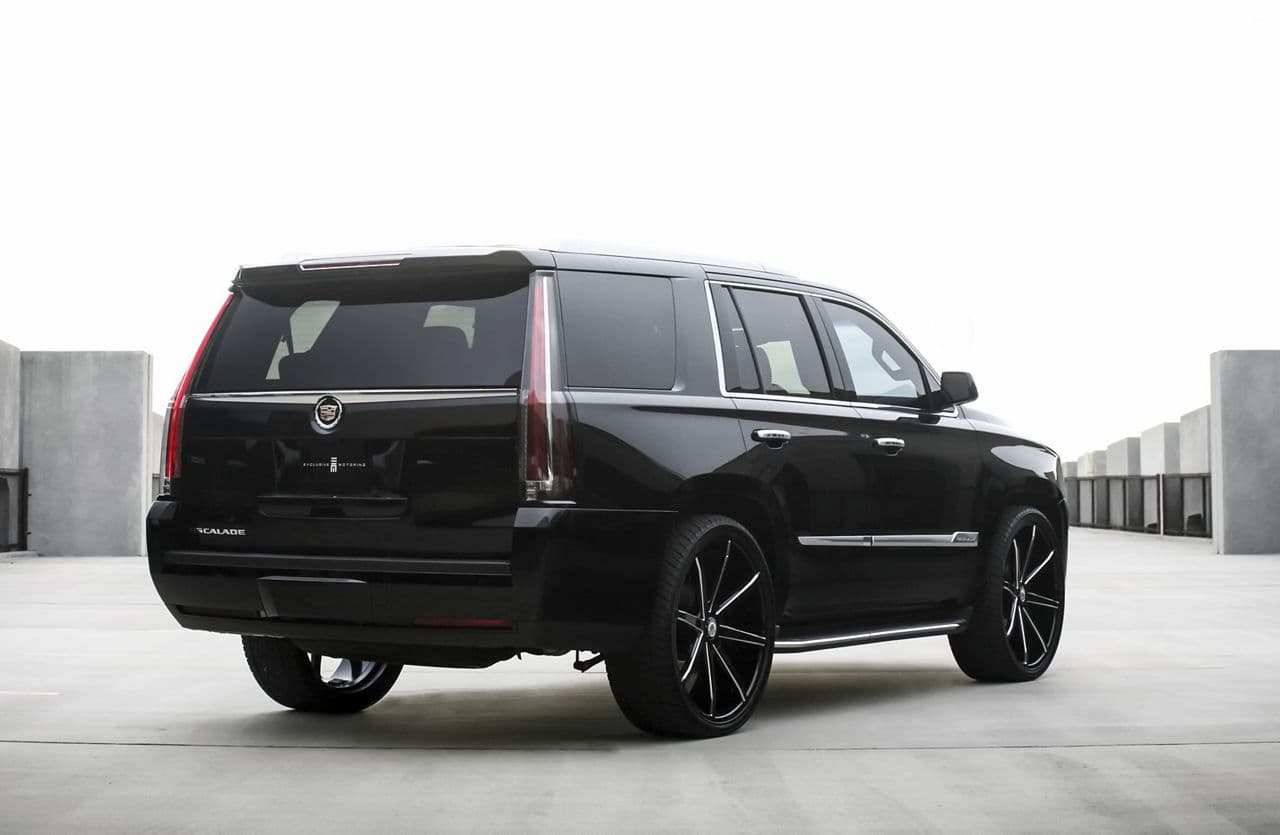 Side profile of 2014 Cadillac Escalade with vehicle wraps
