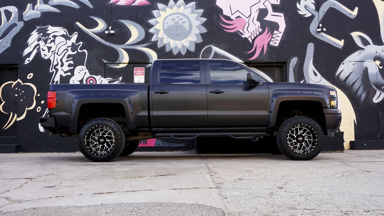 Rear view of 2014 Chevrolet Silverado with wheels