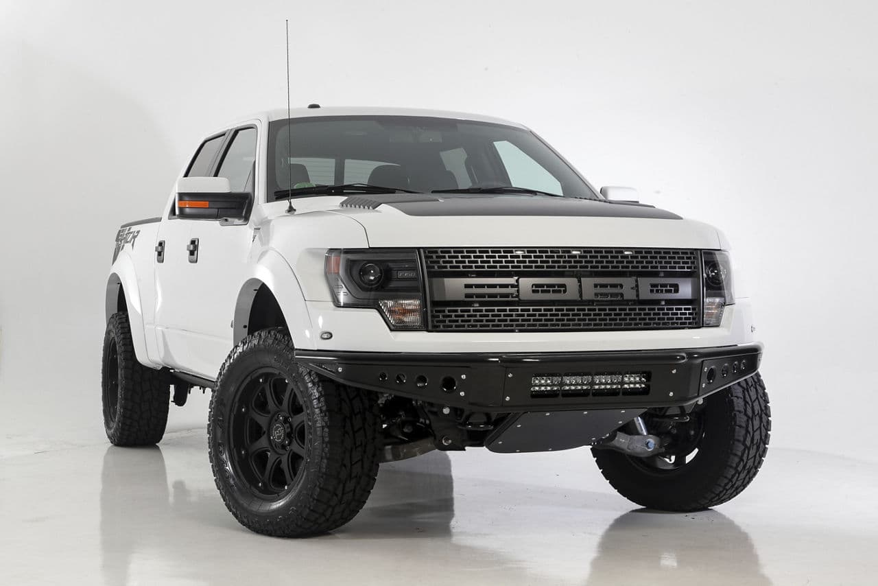 Front view of 2014 Ford F150 Raptor with truck suv wheels