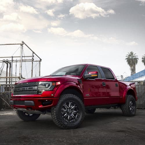 Detail view of 2014 Ford F150 Raptor with wheels