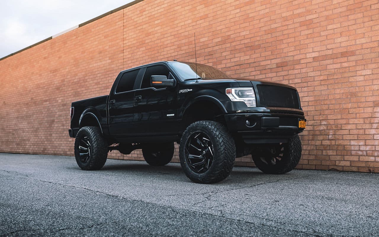 Front view of 2014 Ford F150 with truck suv wheels