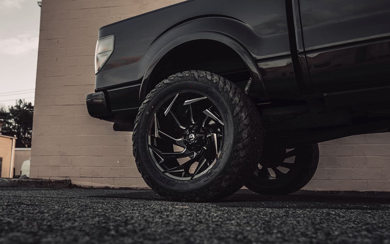 Rear view of 2014 Ford F150 with truck suv wheels