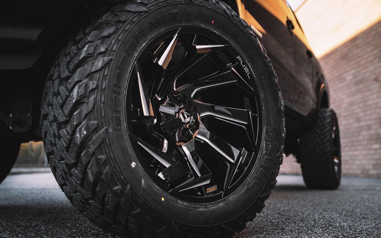 Detail view of 2014 Ford F150 with truck suv wheels