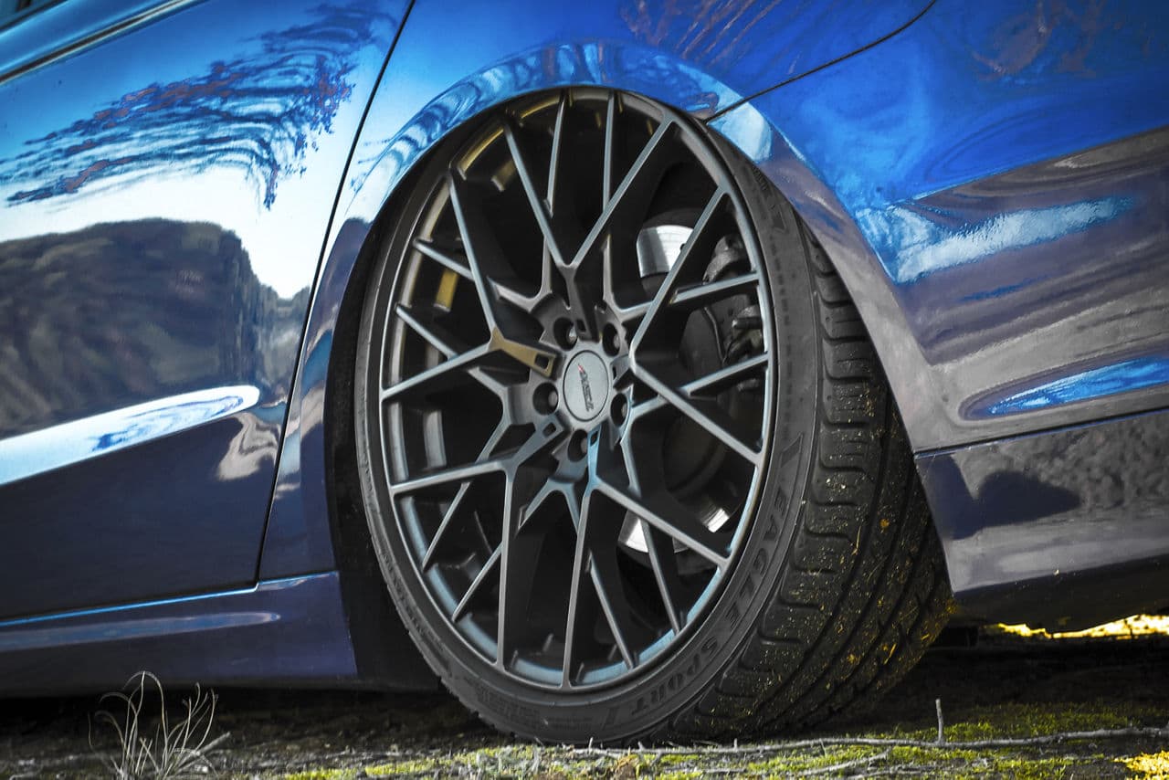 Rear view of 2014 Ford Fusion with wheels