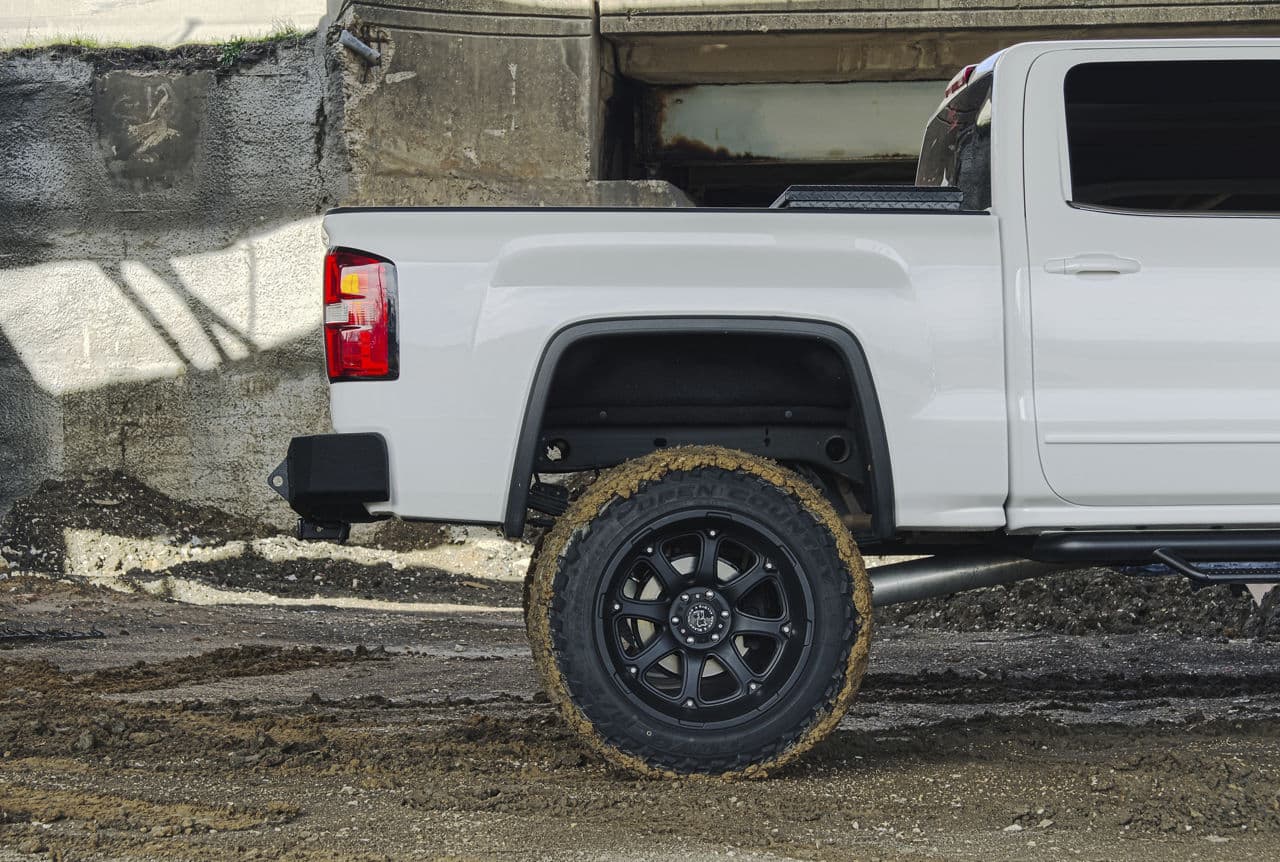 Rear view of 2014 GMC Sierra with wheels