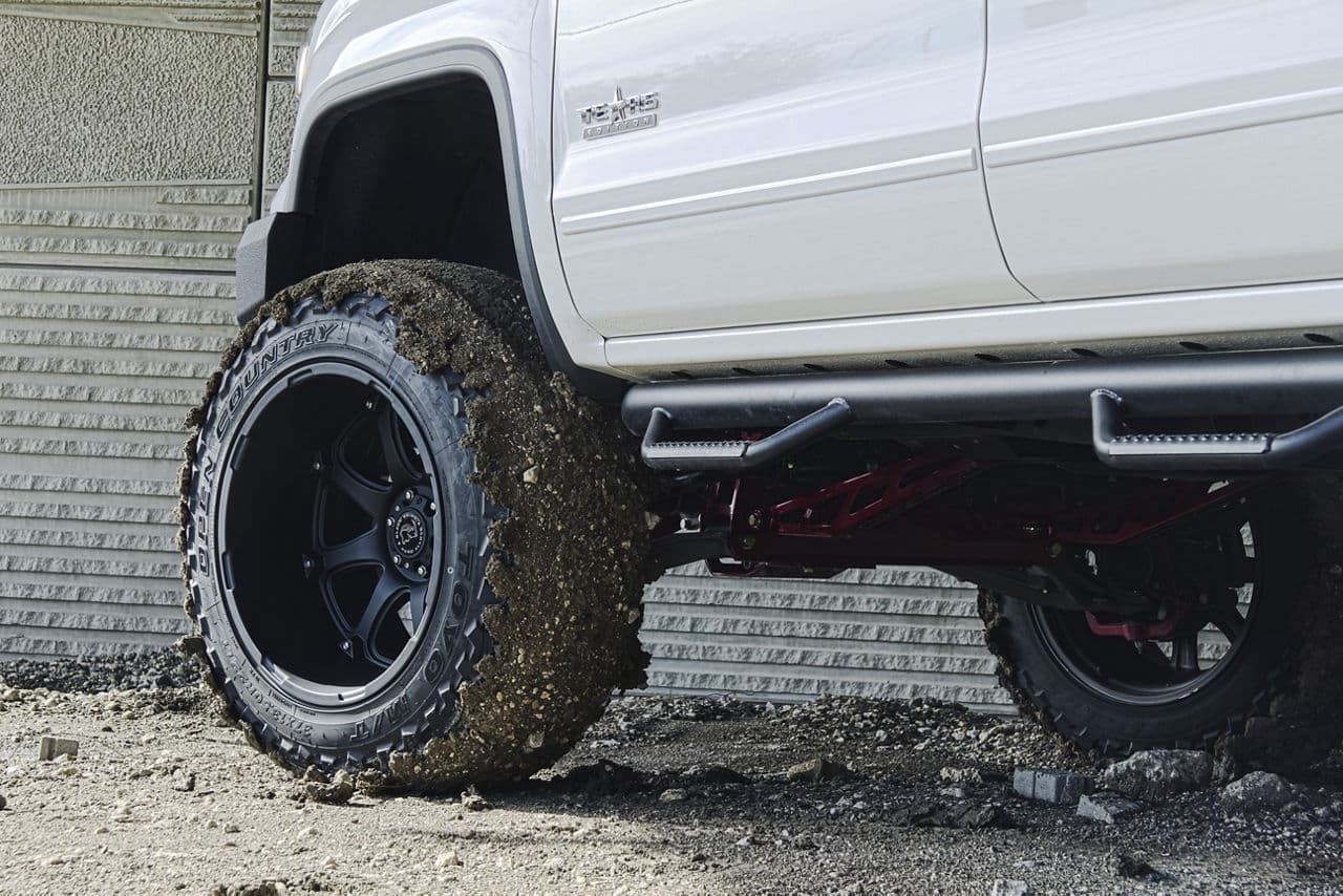 Detail view of 2014 GMC Sierra with wheels