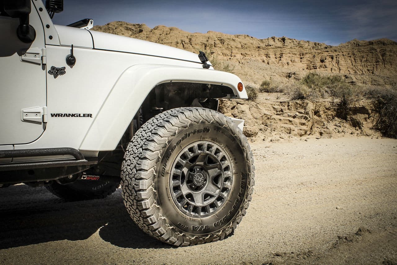 Front view of 2014 Jeep Wrangler JKU with truck suv wheels