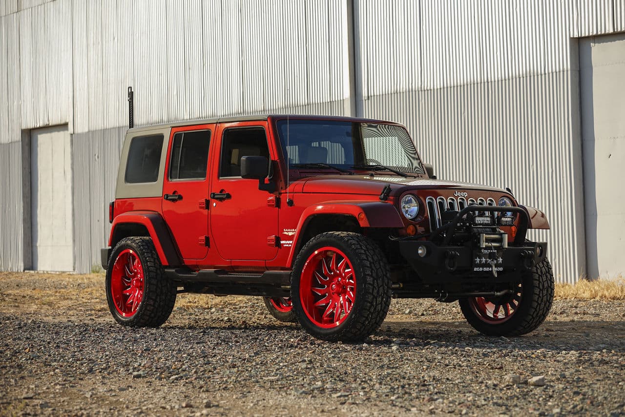 Front view of 2014 Jeep Wrangler Unlimited with wheels