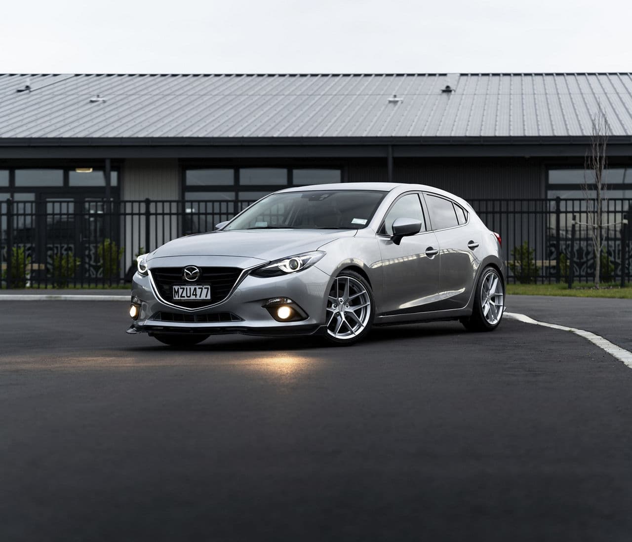 Front view of 2014 Mazda 3 with wheels