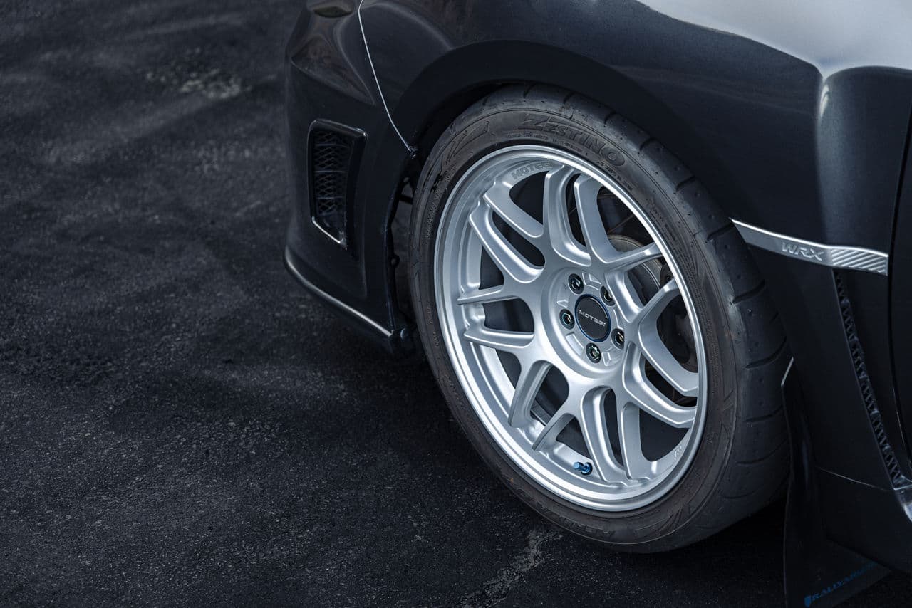 Rear view of 2014 Subaru Impreza WRX with wheels