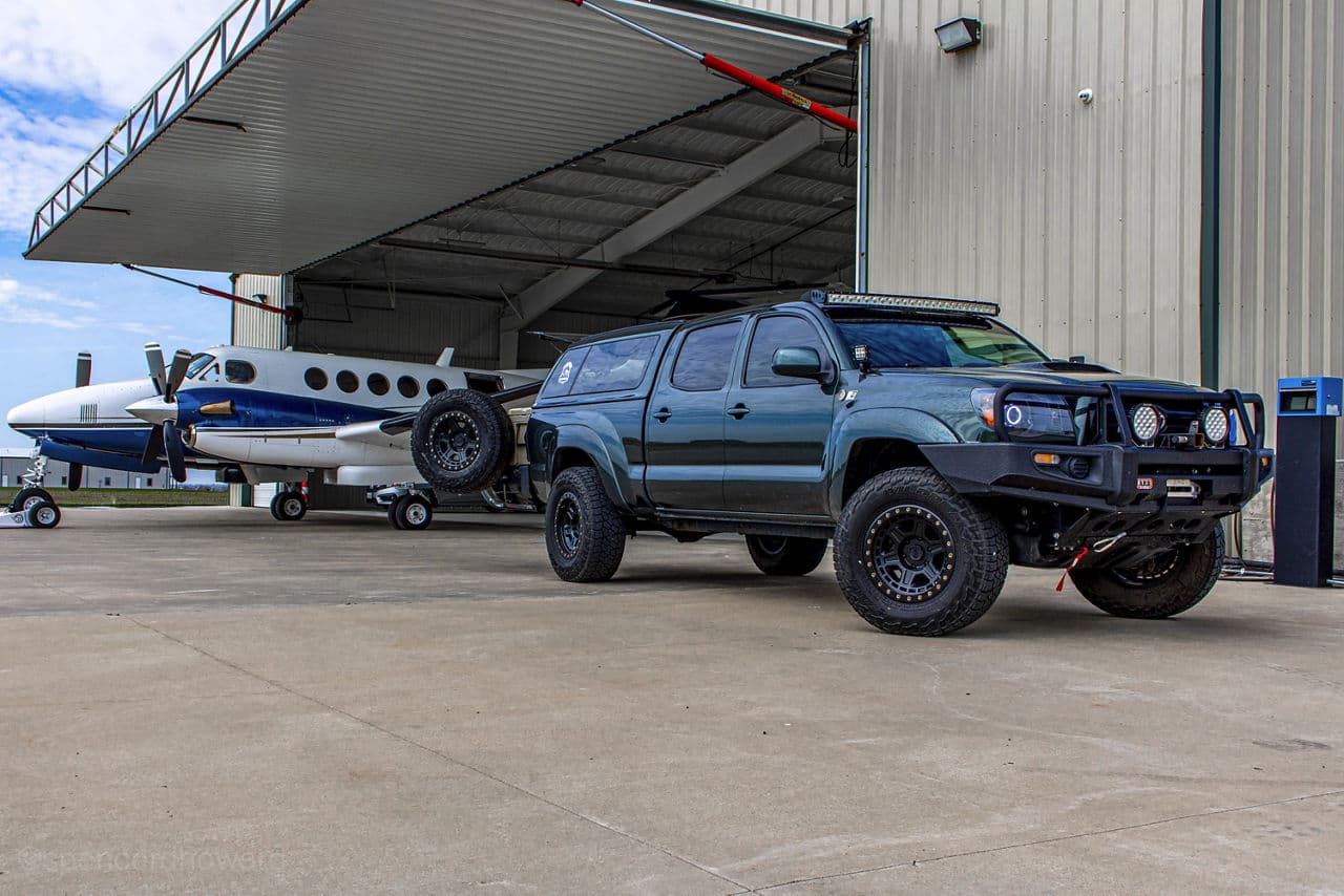 Front view of 2014 Toyota Tacoma with truck suv wheels