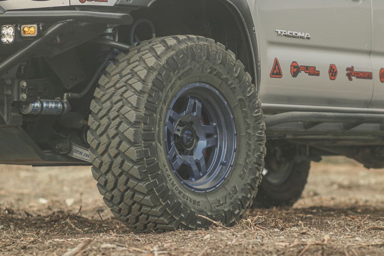 Side profile of 2014 Toyota Tacoma with wheels