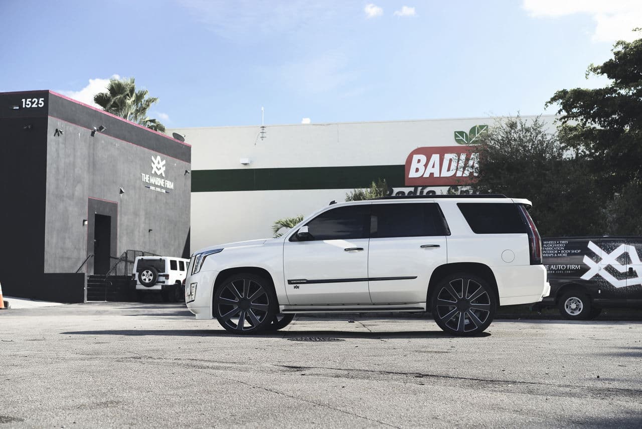 Rear view of 2015 Cadillac Escalade with wheels