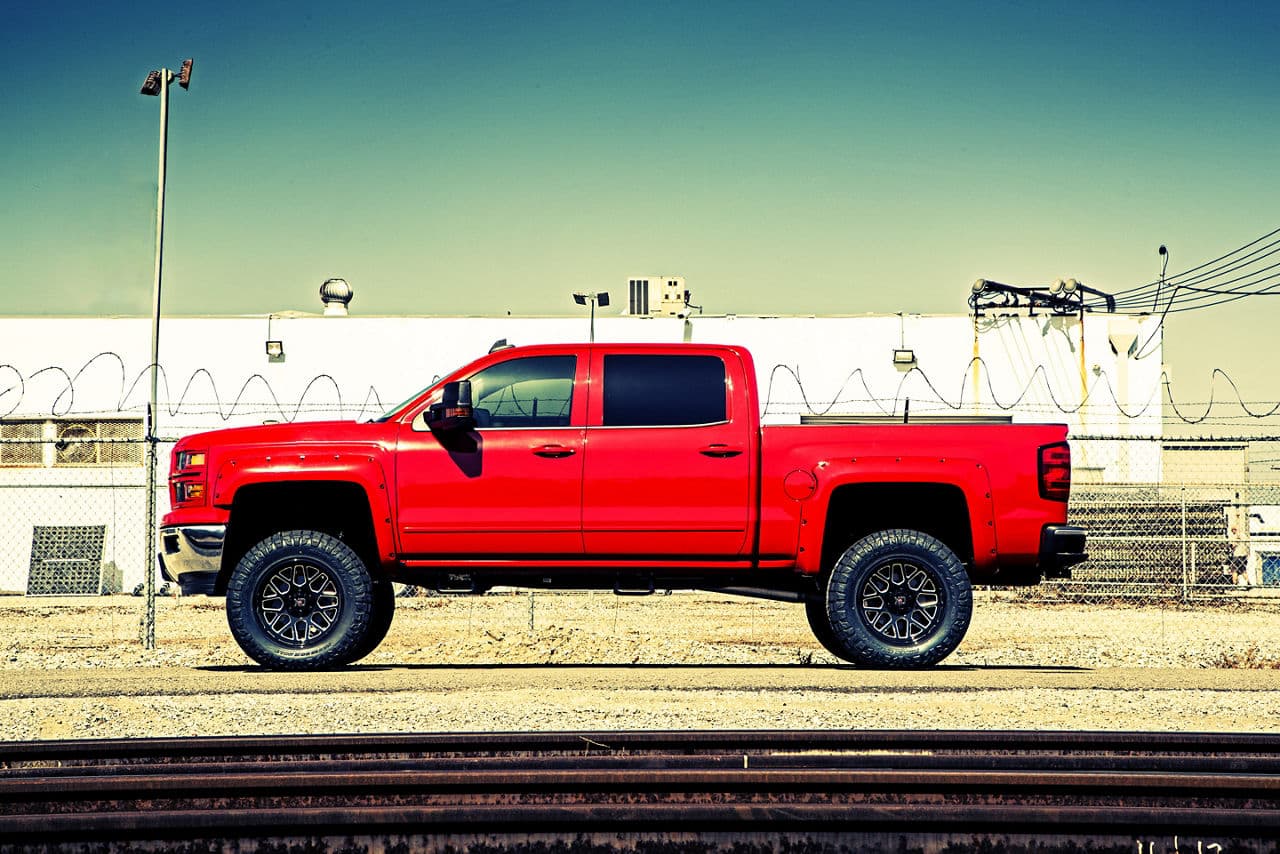 Rear view of 2015 Chevrolet Silverado with wheels