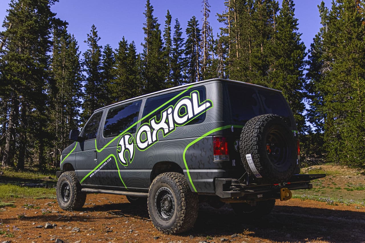 Side profile of 2015 Ford Econoline with wheels