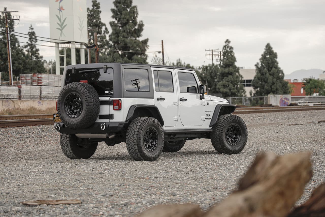 Front view of 2015 Jeep Wrangler with truck suv wheels