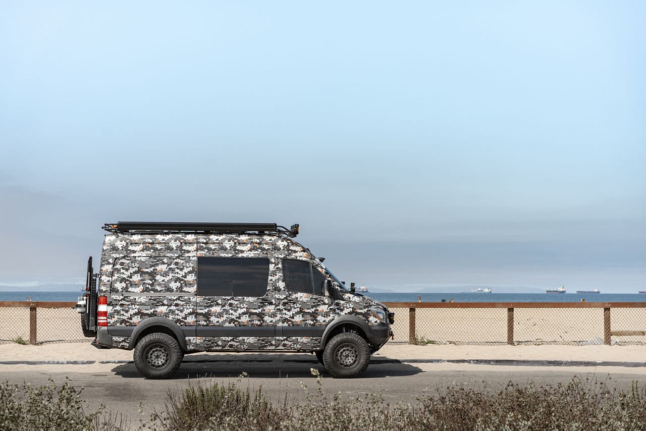 Side profile of 2015 Mercedes-Benz Sprinter with wheels