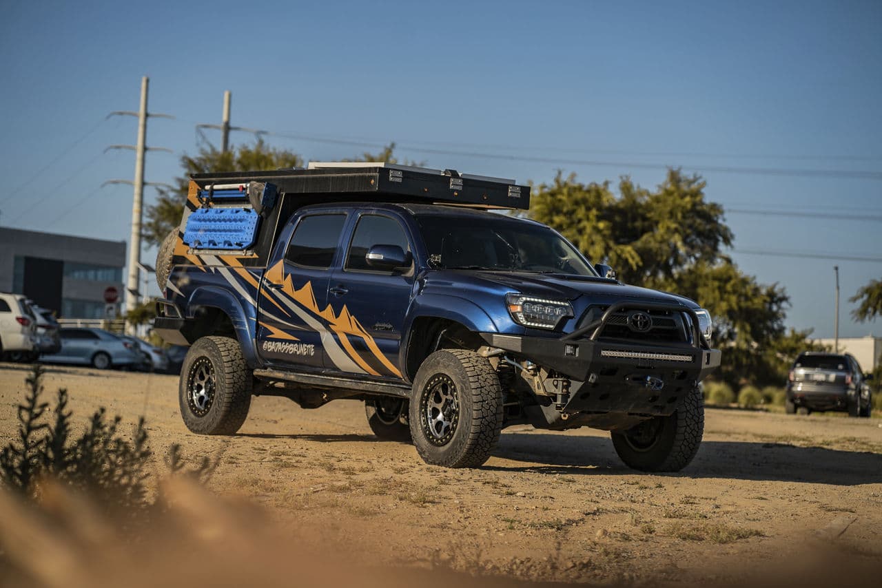Side profile of 2015 Toyota Tacoma with wheels