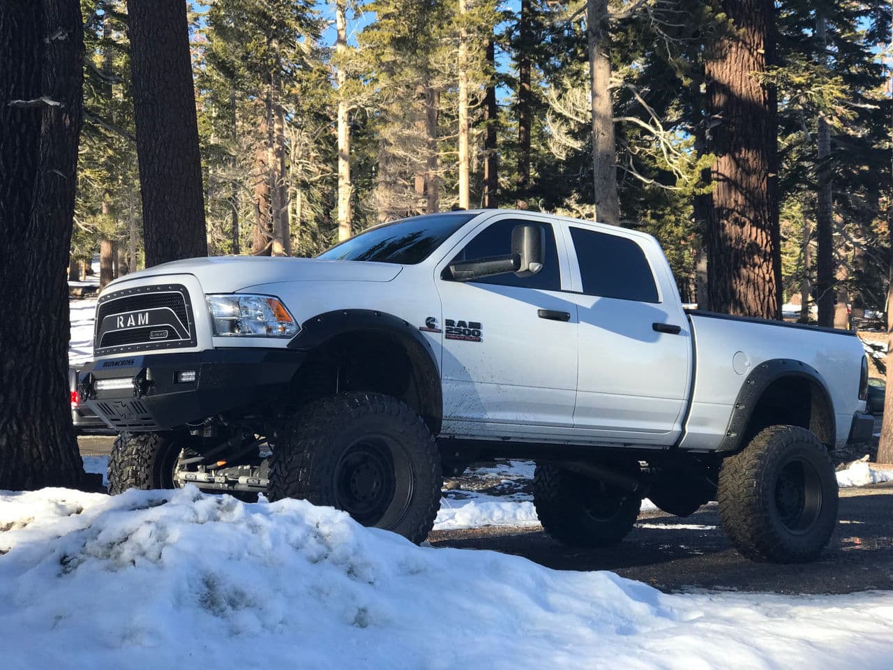 Front view of 2016 Dodge Ram 2500 with truck suv wheels