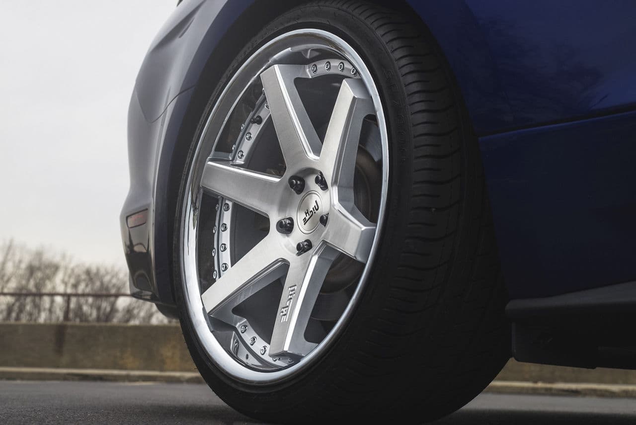 Side profile of 2016 Ford Mustang with wheels