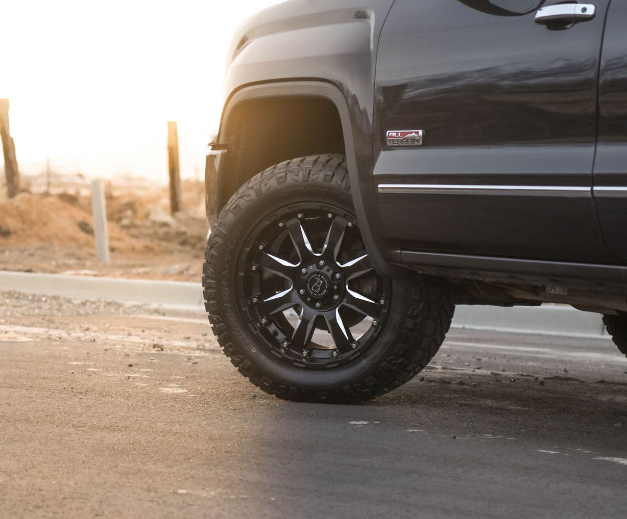 Rear view of 2016 GMC Sierra with wheels