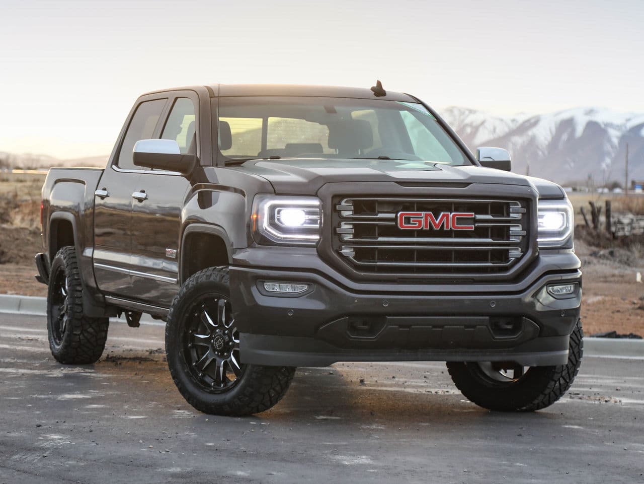 Detail view of 2016 GMC Sierra with wheels