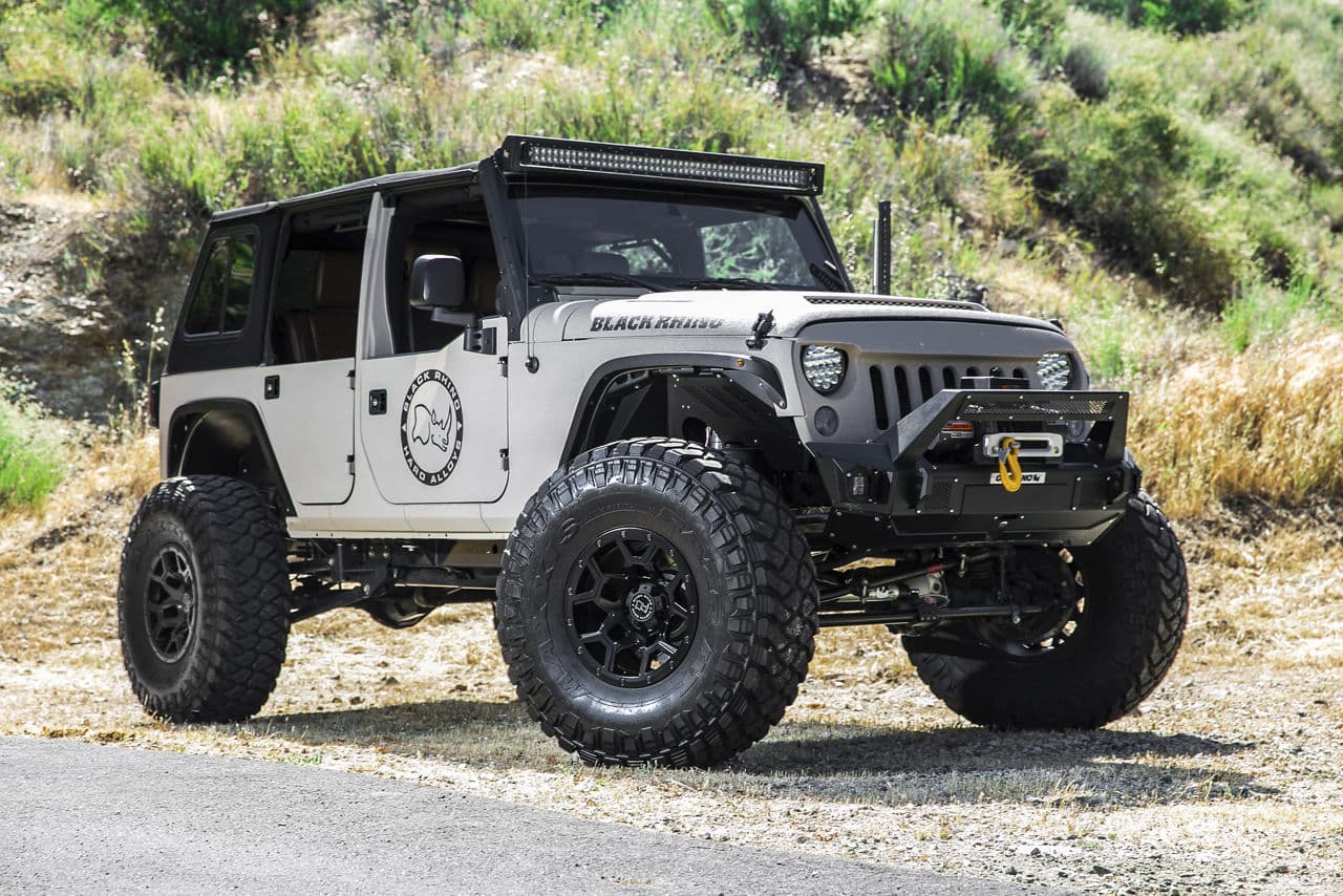 Front view of 2016 Jeep Wrangler with truck suv wheels