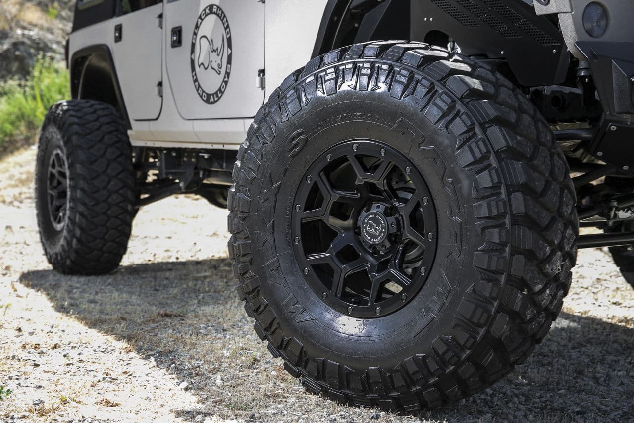 Side profile of 2016 Jeep Wrangler with truck suv wheels