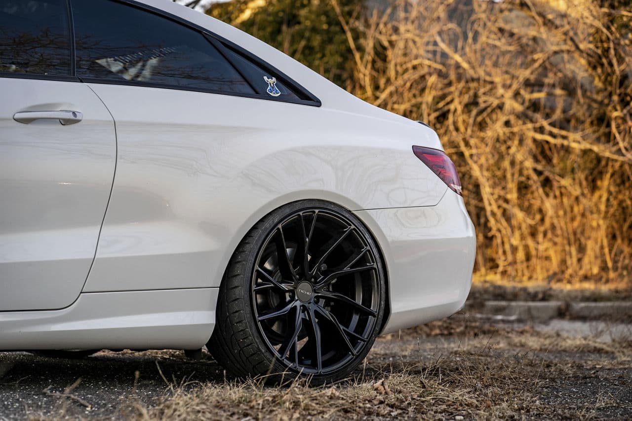 Side profile of 2016 Mercedes-Benz E400 with vehicle wraps