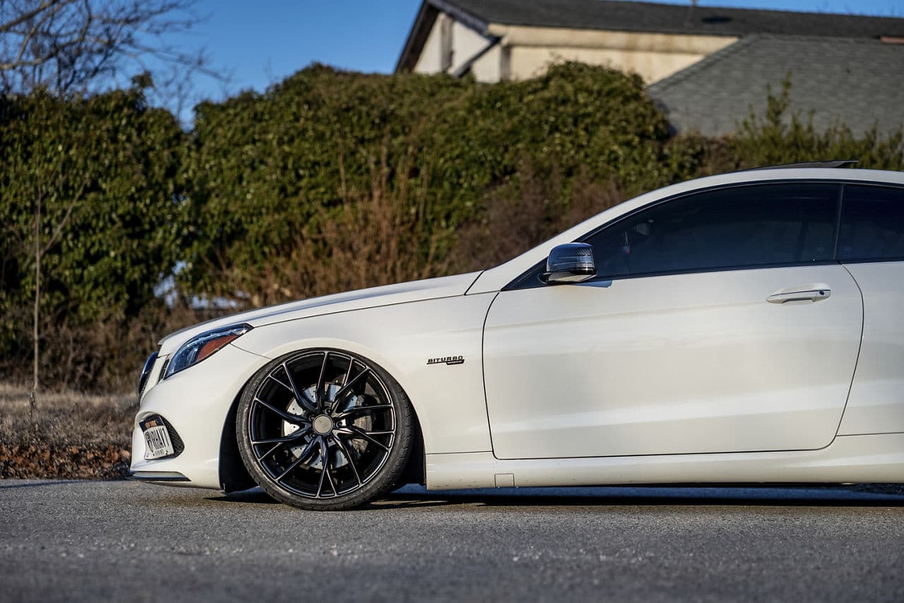 Detail view of 2016 Mercedes-Benz E400 with vehicle wraps
