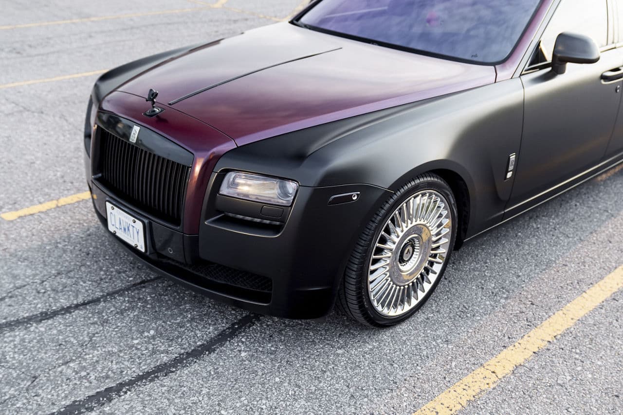 Rear view of 2016 Rolls-Royce Ghost with wheels