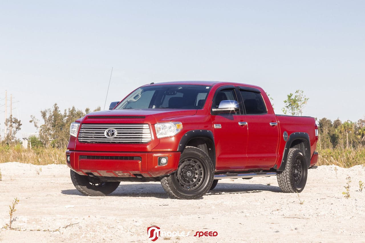 Front view of 2016 Toyota Tundra with custom wheels and tires