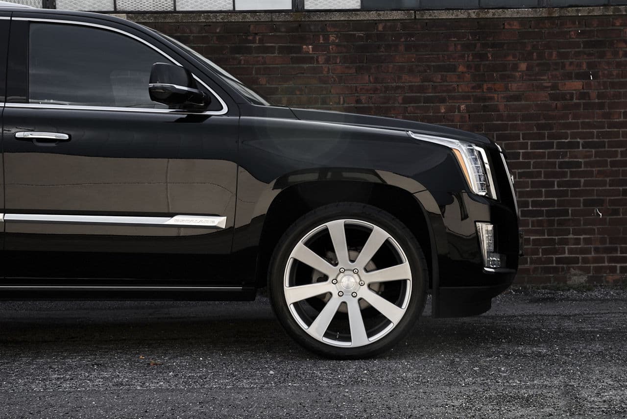 Rear view of 2017 Cadillac Escalade with wheels
