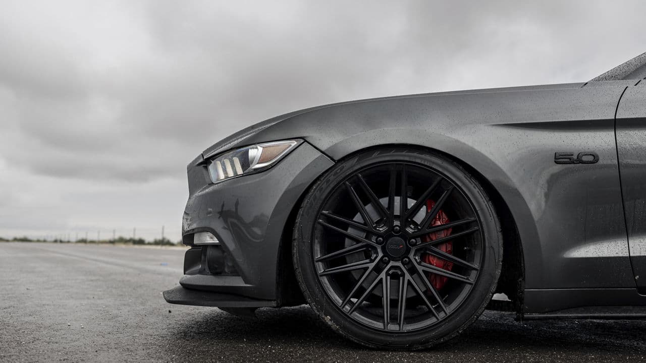 Side profile of 2017 Ford Mustang with wheels