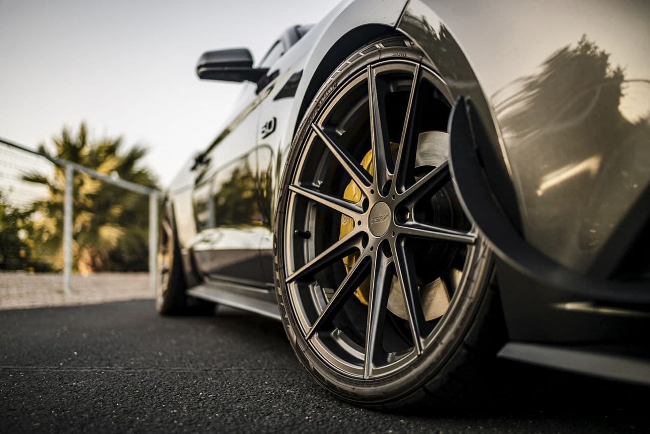 Side profile of 2017 Ford Mustang with wheels