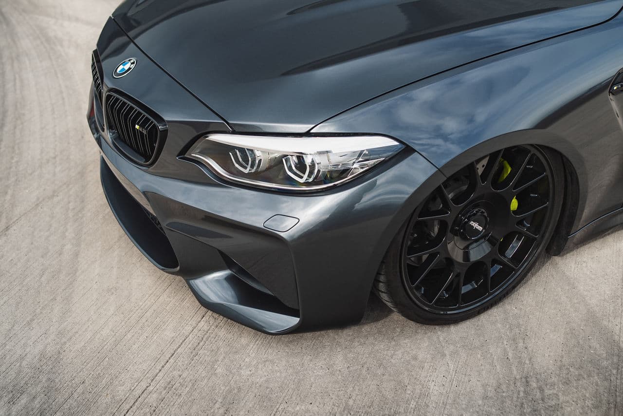 Rear view of 2018 BMW M2 with wheels