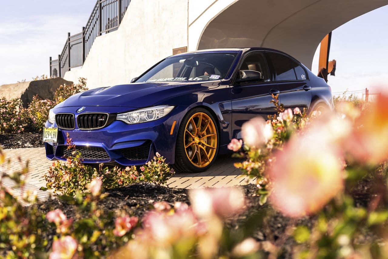 Side profile of 2018 BMW M3 with vehicle wraps