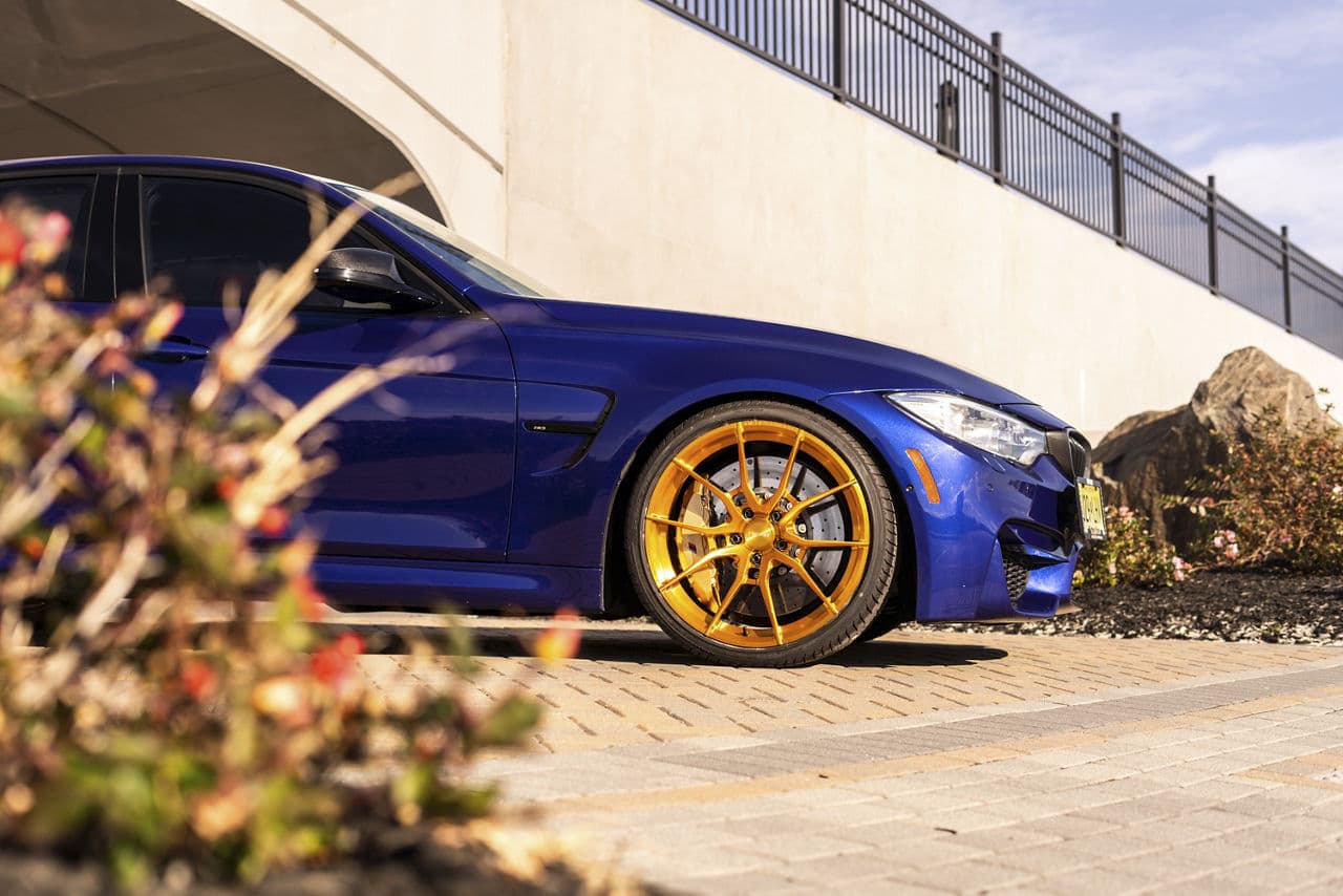 Rear view of 2018 BMW M3 with vehicle wraps
