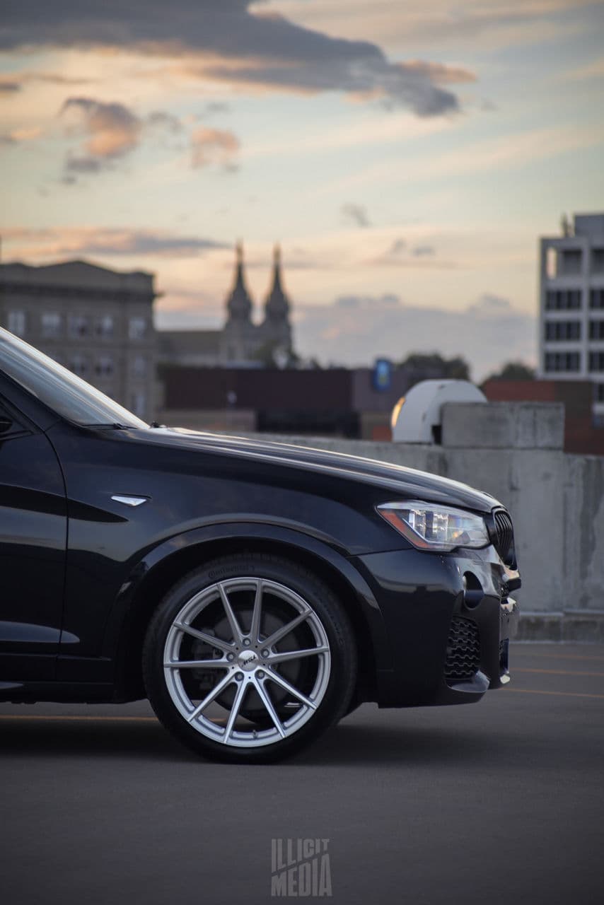 Rear view of 2018 BMW X3 with wheels