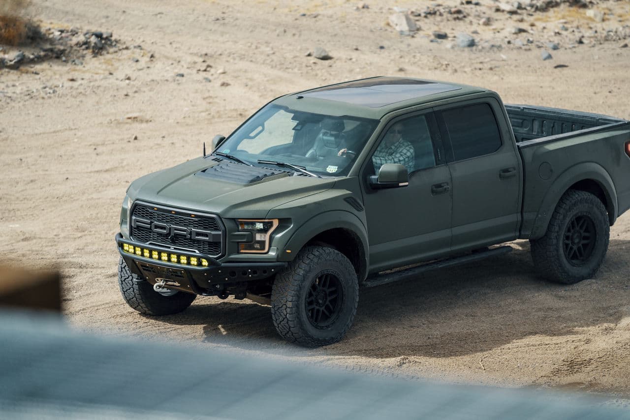 Front view of 2018 Ford F150 Raptor with truck suv wheels