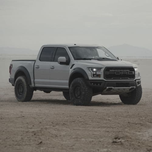 Side profile of 2018 Ford F150 Raptor with wheels